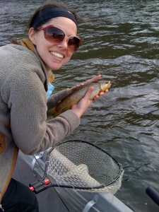 My wife Lindsey giving Leroy, the brown trout, a good old fashioned bum rubbing. 